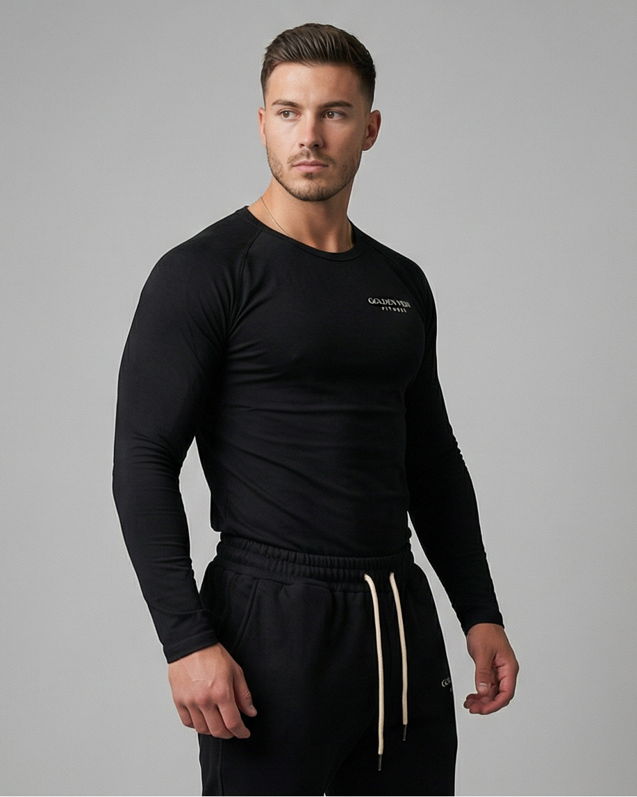 Schwarzes Golden Vein Performance Longsleeve, 45-Grad-Ansicht eines sportlichen männlichen Models im Studio; moderner, funktionaler Athleisure-Look.